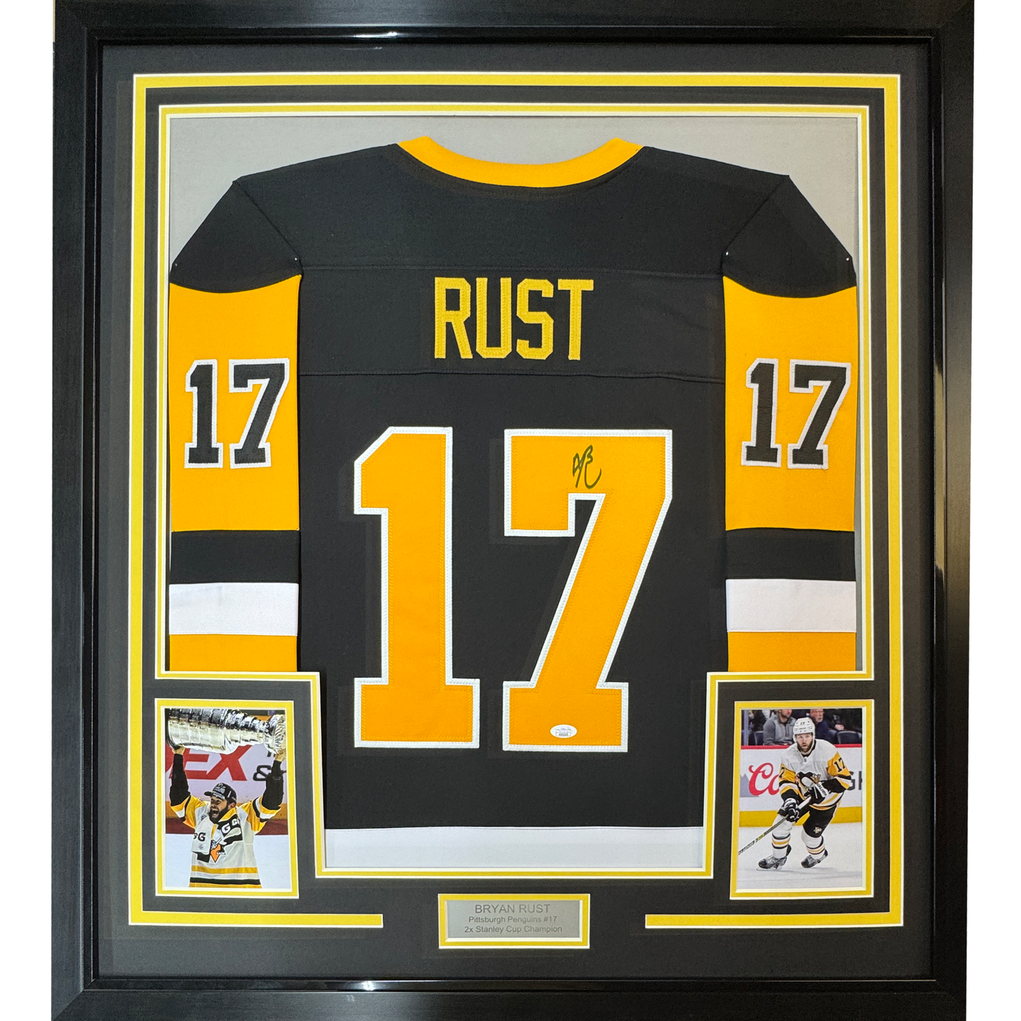 Framed Autographed/Signed Bryan Rust 35x39 Pittsburgh Black Hockey Jersey JSA COA