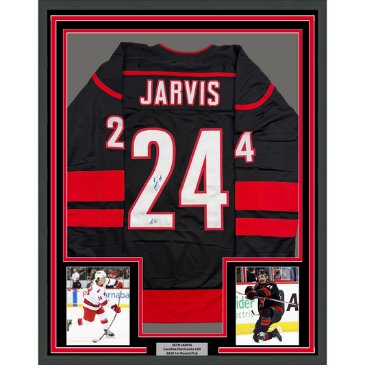 Framed Autographed/Signed Seth Jarvis 35x39 Carolina Black Hockey Jersey Beckett BAS COA
