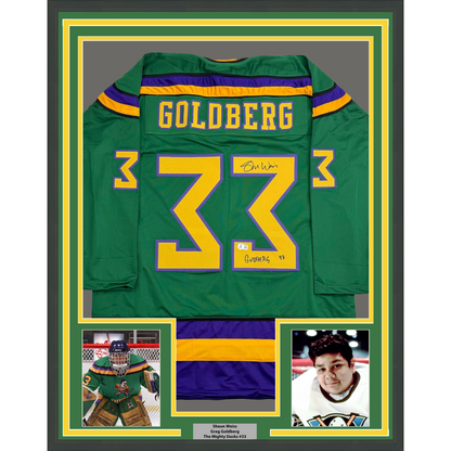 Framed Autographed/Signed Shaun Weiss Greg Goldberg 35x39 The Mighty Ducks Green Hockey Jersey Beckett BAS COA