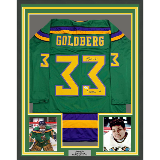 Framed Autographed/Signed Shaun Weiss Greg Goldberg 35x39 The Mighty Ducks Green Hockey Jersey Beckett BAS COA