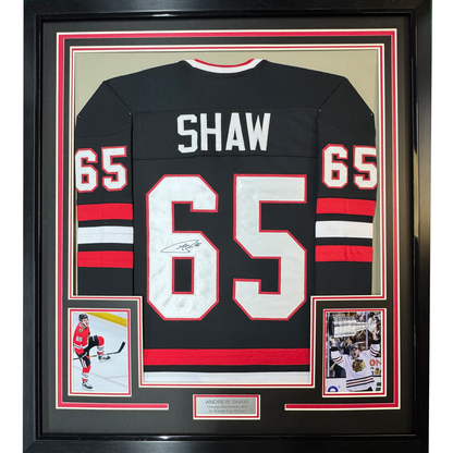 Framed Autographed/Signed Andrew Shaw 35x39 Chicago Black Hockey Jersey JSA COA