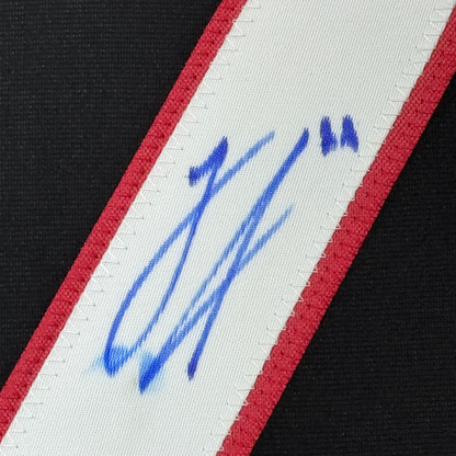 Framed Autographed/Signed Logan Stankoven 35x39 Carolina Black Hockey Jersey Beckett BAS COA