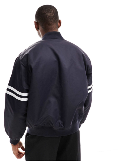 Lacoste unisex varsity jacket with logo in black