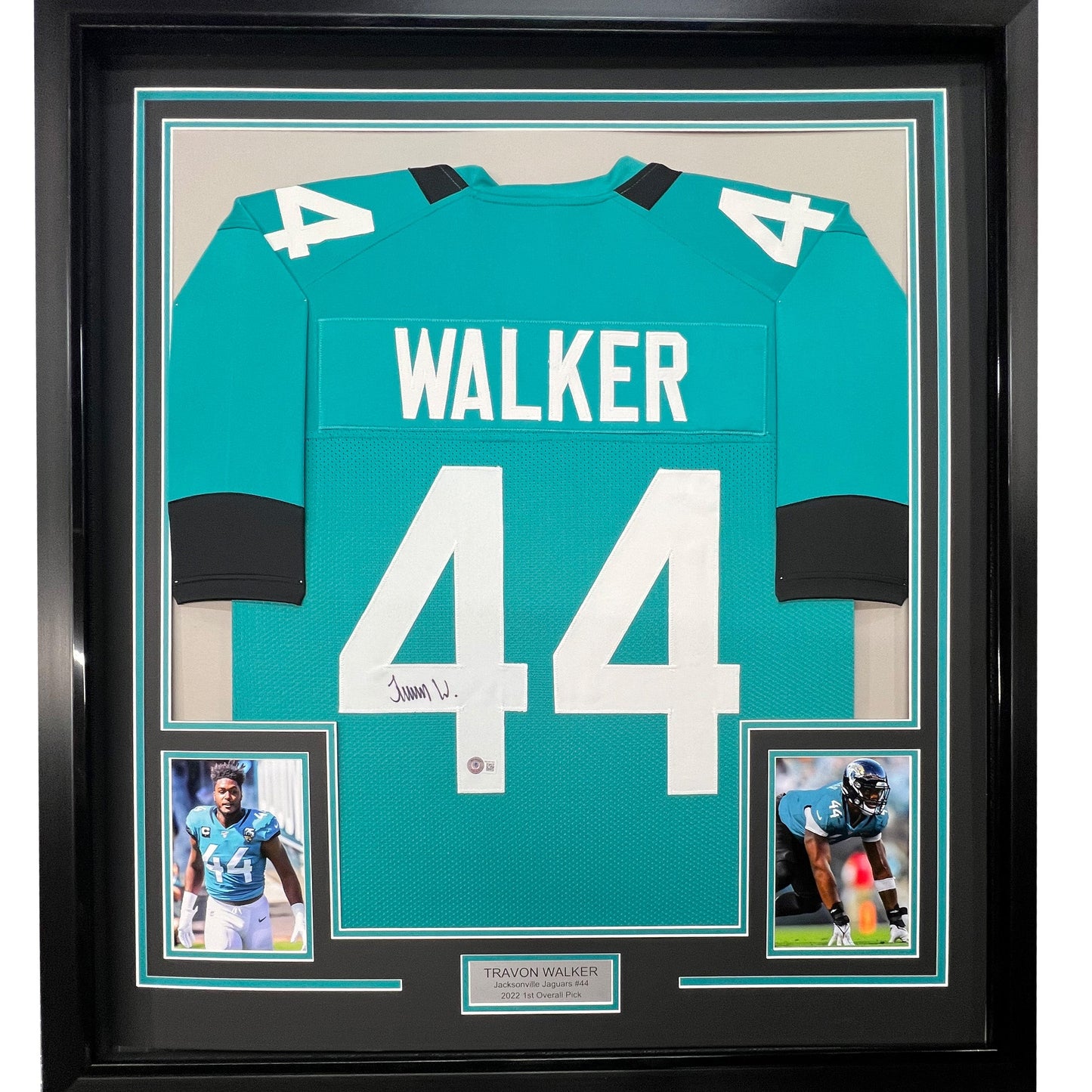 Framed Autographed/Signed Travon Walker 35x39 Jacksonville Teal Football Jersey Beckett BAS COA
