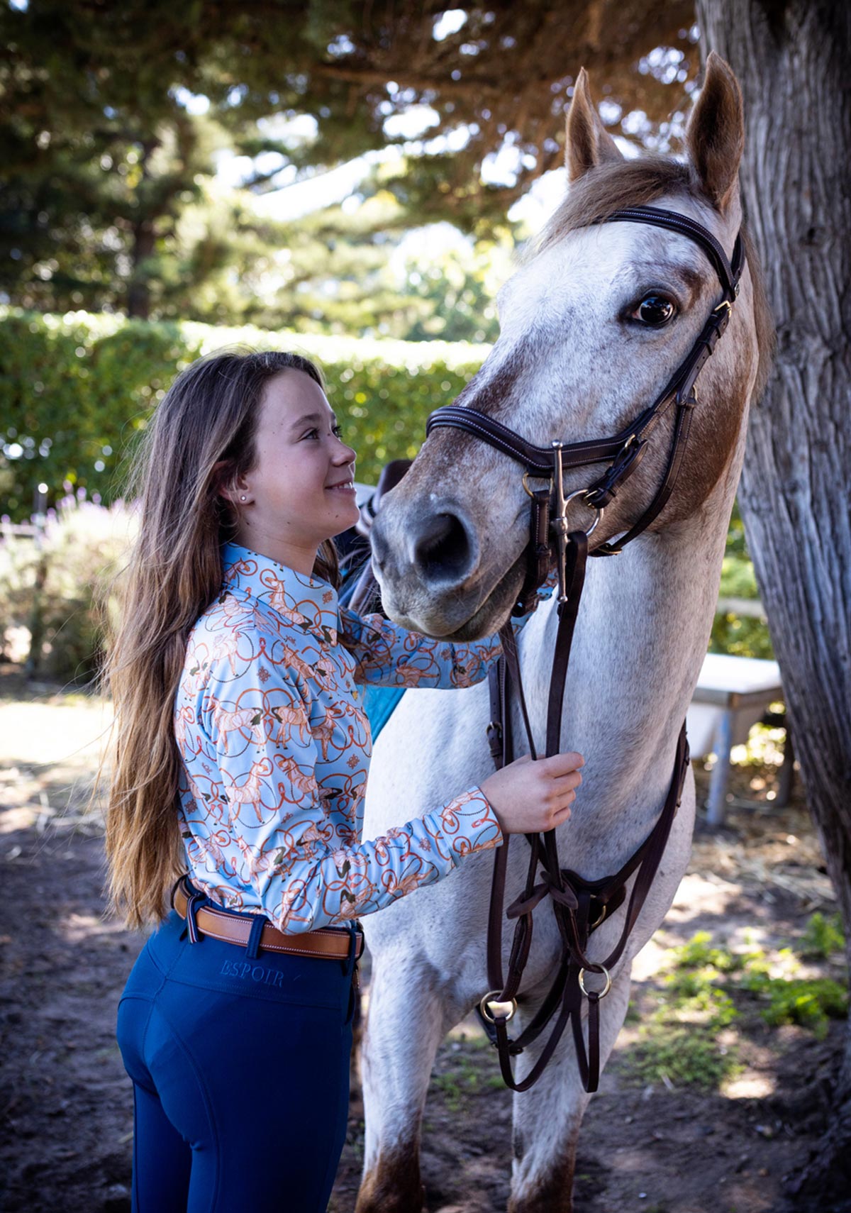 Roped Horses on Sky Blue Ladies Button Shirt