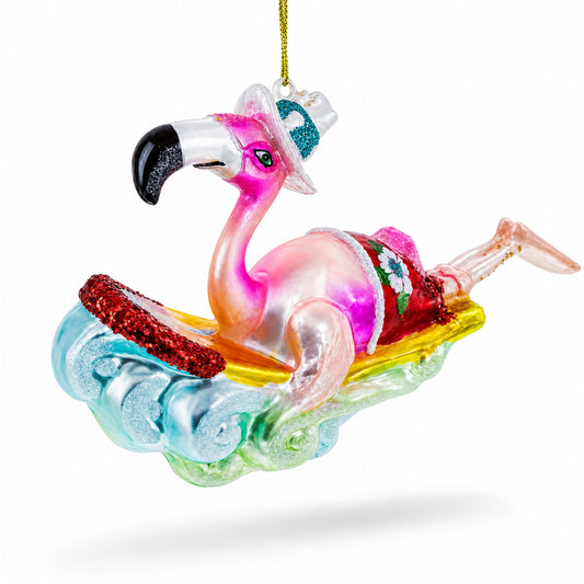 Pink Flamingo Riding a Surf Wave Glass Christmas Ornament
