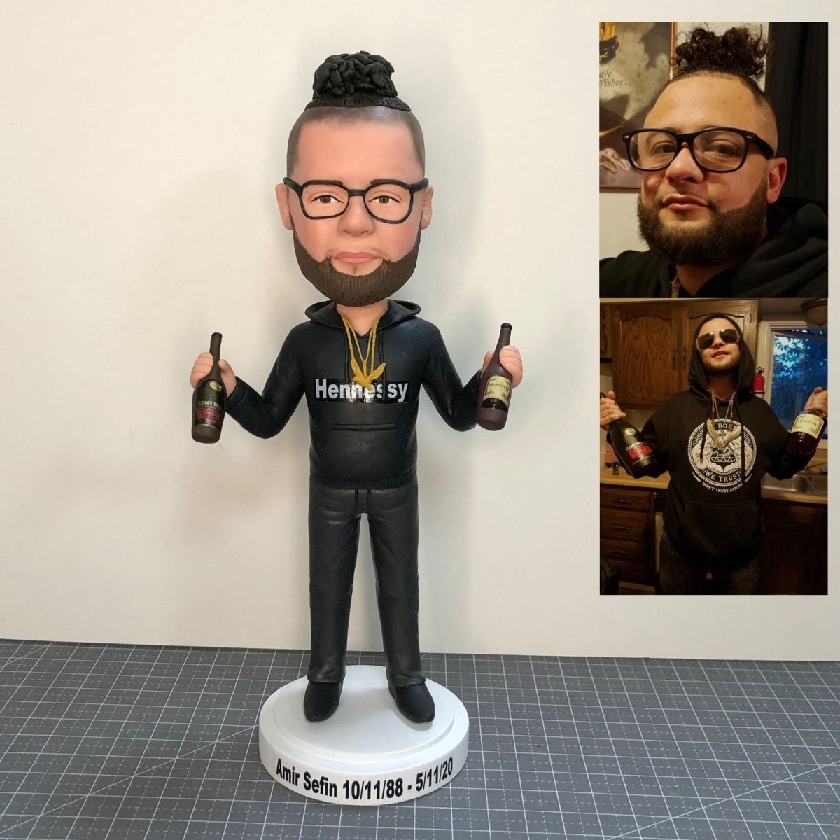 Custom bobblehead holding two bottles of wine