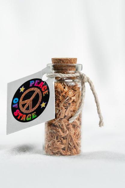 Glass Bottle Filled with Shavings and Sawdust from the Original 1969 Woodstock Stage Wood