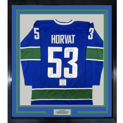 Framed Autographed/Signed Bo Horvat 35x39 Vancouver Blue Hockey Jersey Beckett BAS COA